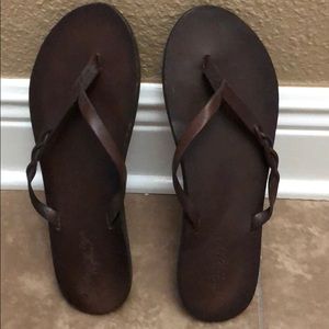 Dark brown American Eagle all leather flip flops